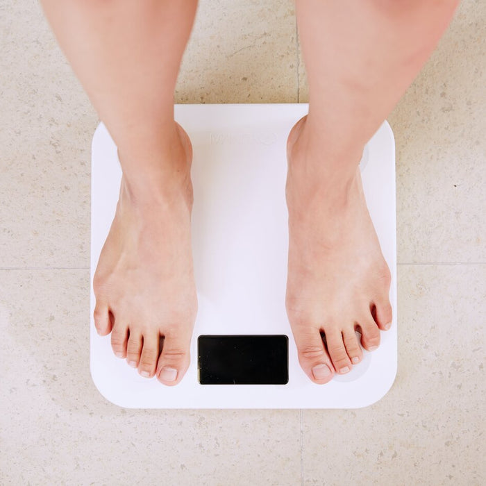 Forbindelsen mellem overvægt og sygefravær: Vægtens rolle afsløret i forskning